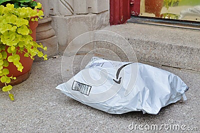 Shipped Home Package Delivered to Customer House Doorstep Editorial Stock Photo