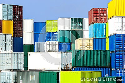 Shipping container stack in diverse, harmonious colors Stock Photo