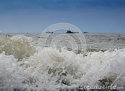 Ships and boats wait out the excitement of the high seas Editorial Stock Photo