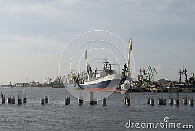 Ships and cranes in the harbour of Klaipeda Stock Photo