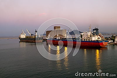 Ships and ferries in the port of La Gullet in Tunisia at sunset Editorial Stock Photo