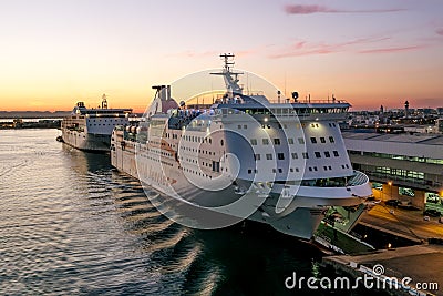 Ships and ferries in the port of La Gullet in Tunisia at sunset Editorial Stock Photo