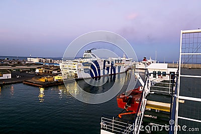 Ships and ferries in the port of La Gullet in Tunisia at sunset Editorial Stock Photo