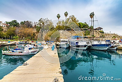 Ships in the old harbour in Antalya Kaleici, Turkey. Editorial Stock Photo