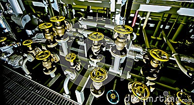 Ships valves, main engine - engineering interior. Stock Photo