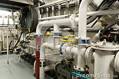 Ships valves, main engine - engineering interior. Stock Photo