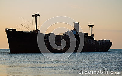 A shipwreck. An old wreck abandoned at sea. The wreck of the ship Stock Photo