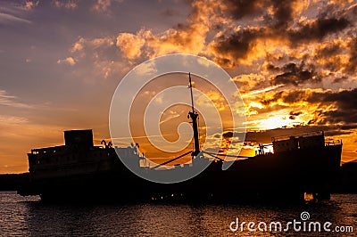 Shipwreck silhouette at shore of Lanzarote Stock Photo