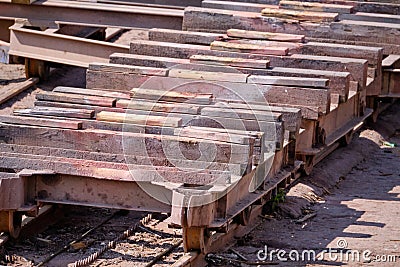 Shipyard for small boats that need repair. Slope of wood and metal on the water Editorial Stock Photo