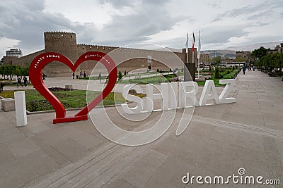 Shiraz, Iran - 04.18.2019: I love Shiraz sign in front of Castle of Karim Khan on a cloudy day. Editorial Stock Photo