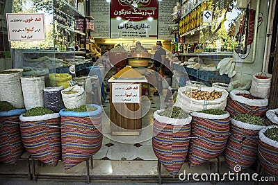 Bags with dried aromatic herbs and spices in a spice store on the Eastern Bazaar Editorial Stock Photo