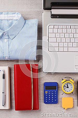Shirt, footnote and laptop. Stock Photo