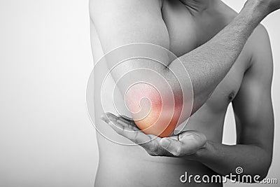 Shirtless male body showing elbow joint pain Stock Photo