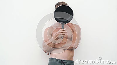 Shirtless Man with Frying Pan Uses Her Like Guitar, Plays it, Funny Video  Stock Footage - Video of laughs, show: 168992988
