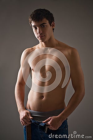 Shirtless young man Stock Photo