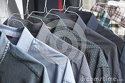 Shirts at the dry cleaners freshly ironed Stock Photo