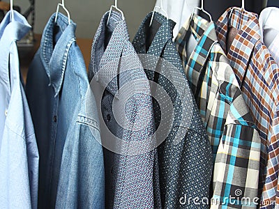 Shirts at the dry cleaners freshly ironed Stock Photo