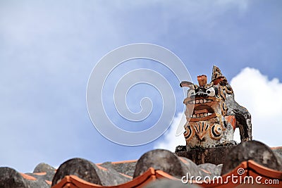 Shisa guardian from Kingdom of Ryukyu on the roof in Okinawa Stock Photo