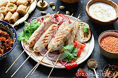 Shish kebab, meat skewers or shashlik served with grilled vegetables Stock Photo