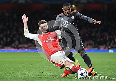 Shkodran Mustafi and Douglas Costa Editorial Stock Photo