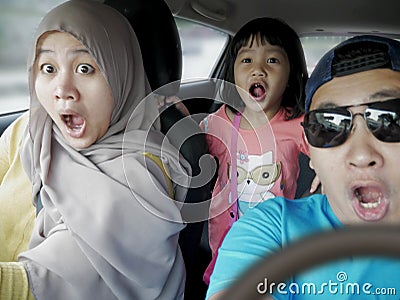 Shocked Asian Muslim Family in Car Trip abouth to Have Accident Stock Photo