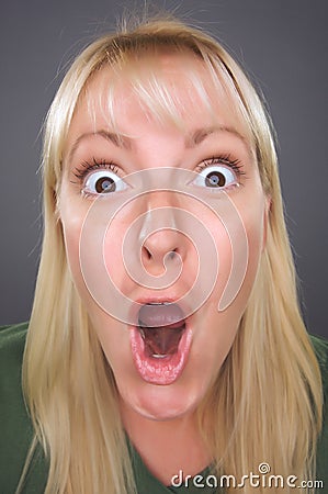 Shocked Blond Woman with Funny Face Stock Photo