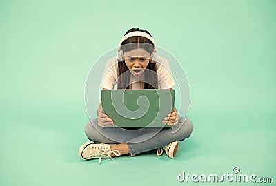 shocked kid chatting on computer. buy online. back to school. teen influencer blogging. Stock Photo