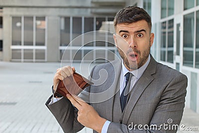 Shocked man with no money Stock Photo