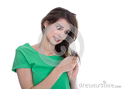 Shocked and sad woman - broken hair after coloration. Stock Photo