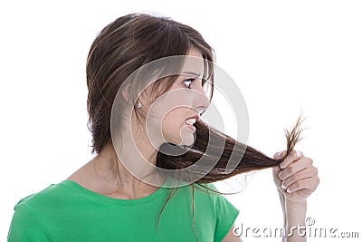 Shocked and sad woman - broken hair after coloration. Stock Photo