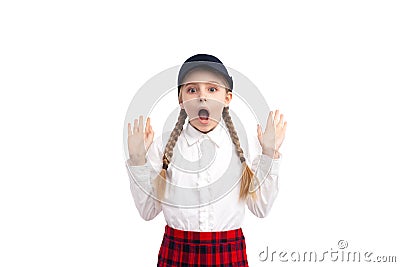 Shocked schoolgirl looking at camera Stock Photo