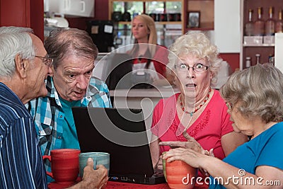 Shocked Seniors with Laptop Stock Photo