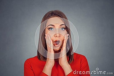 Shocked surprised stunned woman Stock Photo