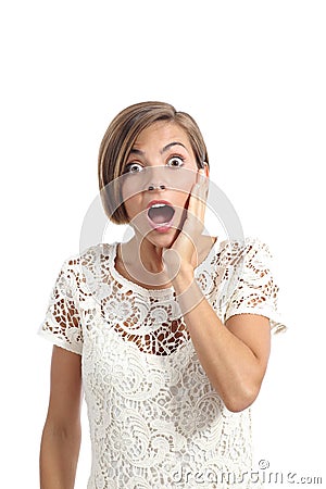 Shocked or surprised woman with a hand on face expressing wow Stock Photo