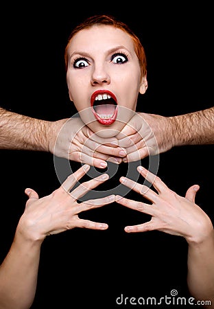 Shocked woman on black background Stock Photo