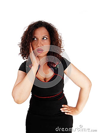 Shocked woman with hand on face. Stock Photo