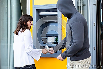 Shocked Woman Looking At Thief Stealing Her Money Stock Photo