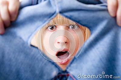 Shocked Woman with Torn Jeans Stock Photo