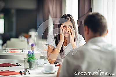 Shocked woman handling bad news,not believing negative event.Stressed crying female having relationship problems.Scandal Stock Photo