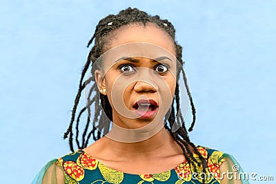 Shocked young African American woman Stock Photo