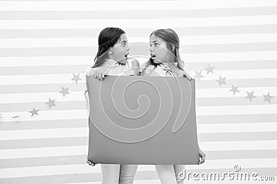 Shocking announcement concept. Amazing surprising news. Girl hold advertising banner. Girls kids holding paper banner Stock Photo