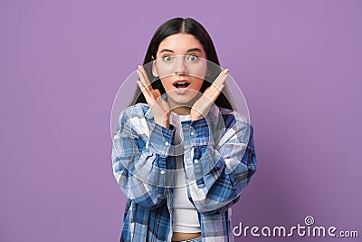 Shocking season sales. Extremely surprised young multiracial woman 29s with mouth open gesturing isolated on purple Stock Photo
