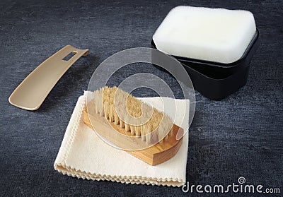Shoe brush, soft polishing cloth, shoe spoon, sponge with silicone Stock Photo