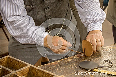 The shoe-maker Stock Photo