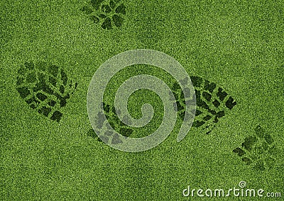 Shoe print on green grassland Stock Photo