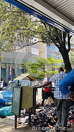 Shoe vendors at Kimathi street, streets of Nairobi Kenya Editorial Stock Photo