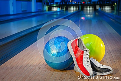 Shoes and balls for bowling game Stock Photo