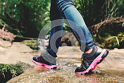 Shoes and feet women in nature Stock Photo