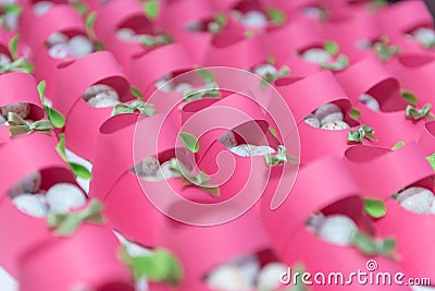 Shoes filled with candy pink paper Stock Photo