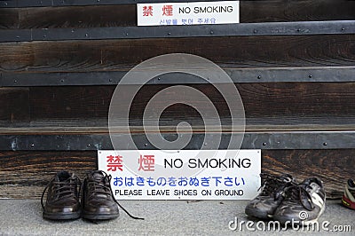 Shoes outside of a Buddhist Temple Stock Photo